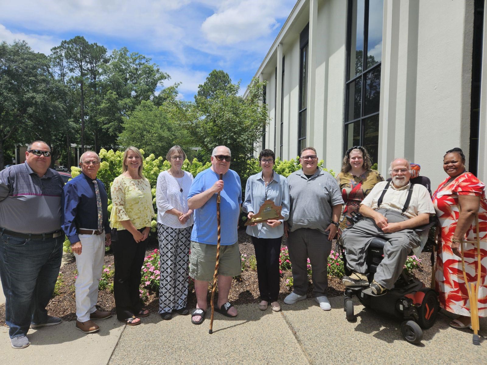 Photo - Council Members gather outside of the DARS Central Office.